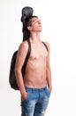 Young guitarist wearing no top with his acoustic guitar on back Royalty Free Stock Photo