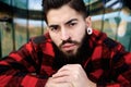 Young guy with beard and piercings Royalty Free Stock Photo