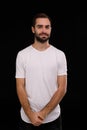 The guy in the white T-shirt on a black background Royalty Free Stock Photo