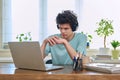 Guy student in headphones looking at web cam computer, talking studying online Royalty Free Stock Photo