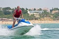 Young guy cruising on a jet ski Royalty Free Stock Photo