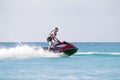 Young guy cruising on a jet ski Royalty Free Stock Photo