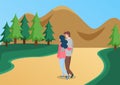 Young guy and girl hugging in nature, romantic walk. Couple in relationship walking in forest
