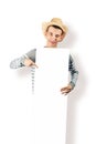 A young guy is holding a blank billboard Royalty Free Stock Photo