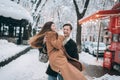 Young guy holds a beautiful girl in his arms Royalty Free Stock Photo