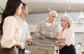 Young guy introducing his girlfriend to his discontented parents at home Royalty Free Stock Photo