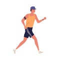 Young guy jogging with armband. Man running in summer sportswear. Sport activity. Male in shorts and trainers. Cardio Royalty Free Stock Photo