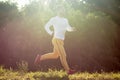 Young guy jogging outdoors