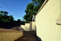 A young guy overcomes obstacles, climbing on concrete walls