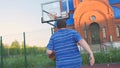Young guy play street basketball