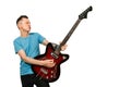 Young guy plays on a retro guitar isolated on a white background Royalty Free Stock Photo