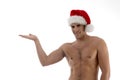 Young guy posing in christmas hat Royalty Free Stock Photo