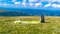 Young guy is preparing for a paragliding flight with an instructor. Extreme hobby and adventure