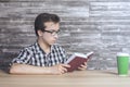 Young guy reading book Royalty Free Stock Photo