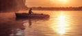 A young guy rides a boat on a lake during a golden sunset. Image of silhouette, Rower at sunset. Man rowing a boat in backlight of