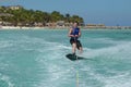 Young Guy Riding a Wakeboard on the Ocean off Aruba Royalty Free Stock Photo