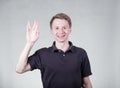 Young guy say hello Royalty Free Stock Photo