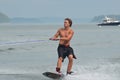 Young Guy in the Summer Riding a Wakeboard in Maine Royalty Free Stock Photo