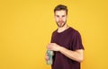 young guy with unshaven face and stylish hair drink water, sport Royalty Free Stock Photo