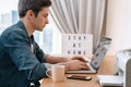 Young guy working remotely from home Royalty Free Stock Photo