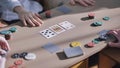 Young guys playing poker at a table. Royalty Free Stock Photo