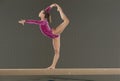 Young gymnast on balance beam