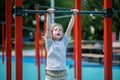 Young gymnast performing an upper body exercise