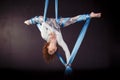 Young gymnast training on aerial silk Royalty Free Stock Photo