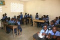 Young Haitian school girls and boys in classroom.