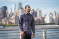 Young handsome African American man smiling and looking optimist Royalty Free Stock Photo