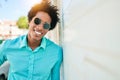 Young handsome african american man wearing casual clothes and sunglasses smiling happy Royalty Free Stock Photo