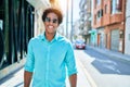 Young handsome african american man wearing casual clothes and sunglasses smiling happy Royalty Free Stock Photo