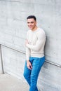 Young handsome American Man relaxing outside