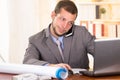 Young handsome architect working in an office