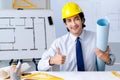 The young handsome architect working on the project Royalty Free Stock Photo