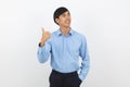 Young handsome asian business man smiling and showing thumbs up isolated on white background. Royalty Free Stock Photo