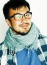 young handsome asian man hipster in glasses on white background, Royalty Free Stock Photo