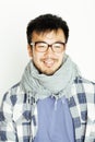 Young handsome asian man hipster in glasses on white background smiling, modern lifestyle concept Royalty Free Stock Photo