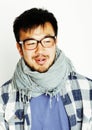 Young handsome asian man hipster in glasses on white background Royalty Free Stock Photo