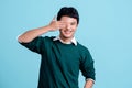 Young handsome Asian man wearing casual clothes over light blue background. He covering his eyes Royalty Free Stock Photo