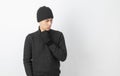 Young handsome asian man wearing grey sweater and beanie thinking an idea while looking up on white background.