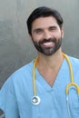 Young handsome bearded doctor smiling