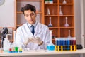 The young handsome biochemist working in the lab Royalty Free Stock Photo