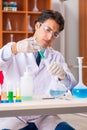 The young handsome biochemist working in the lab Royalty Free Stock Photo