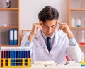 Young handsome biochemist working in the lab Royalty Free Stock Photo