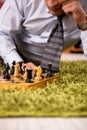 The young handsome boss playing chess during break Royalty Free Stock Photo