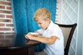 Boy holding a magnifying glass Royalty Free Stock Photo