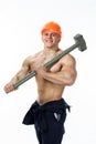 Young and handsome builder with a sledgehammer and body Royalty Free Stock Photo