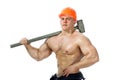 Young and handsome builder with a sledgehammer and body Royalty Free Stock Photo