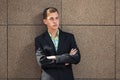 Young handsome business man in black blazer and checked shirt Royalty Free Stock Photo